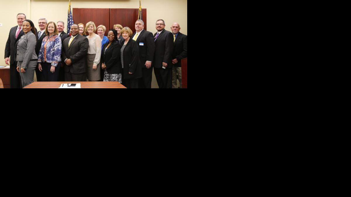 
State superintendent of education Molly Spearman (center, in white) stands with her newly formed Principal Advisory Council, which includes four Rock Hill principals, (front row, left to right) Denise Khaalid, Brenda Campbell and Norris Williams, and (back row, second from left) Ozzie Ahl.
