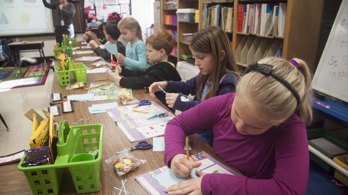 Second-grade Spanish immersion students participate in a lesson Tuesday at Ebinport Elementary School.