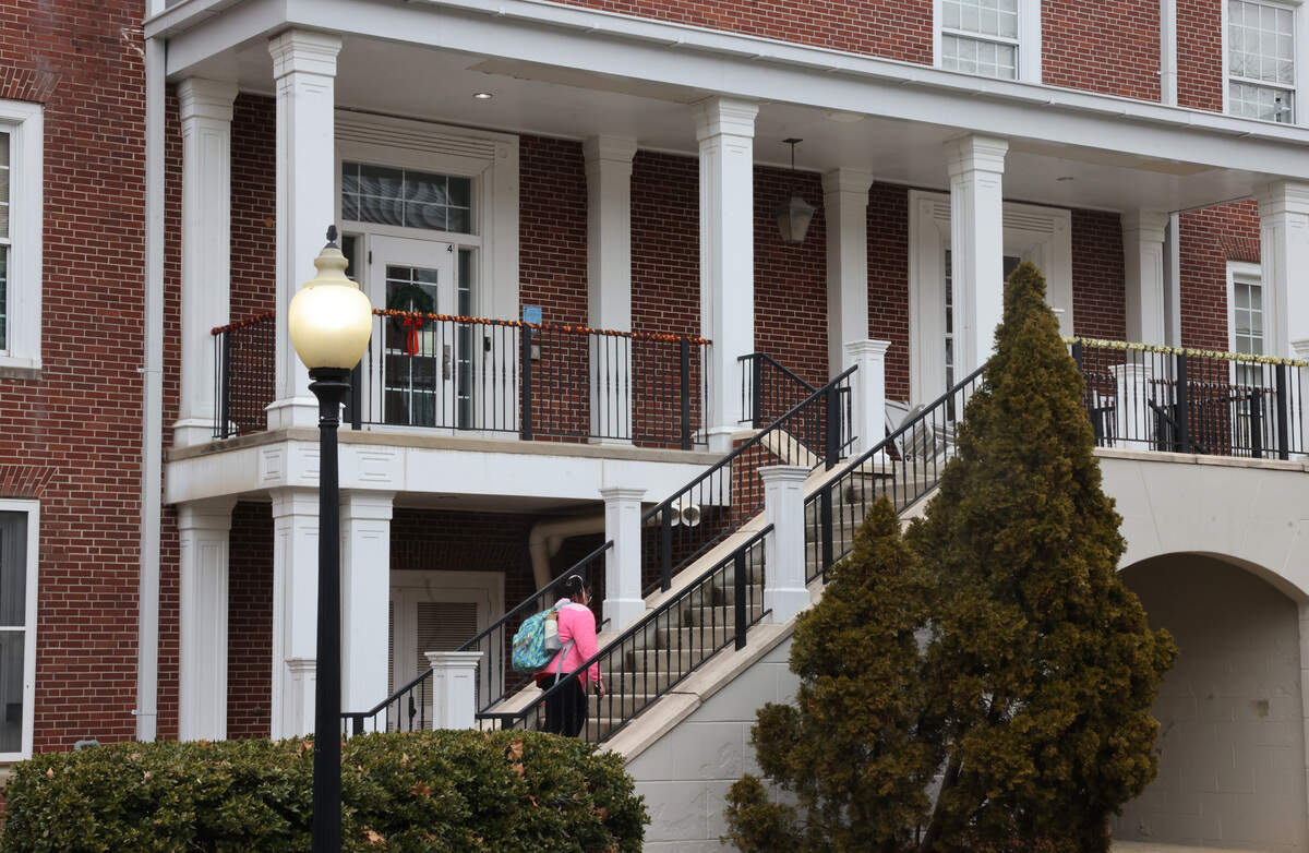 A Winthrop University student walks into a residence hall Thursday, Feb. 5, 2026 in Rock Hill, S.C.
