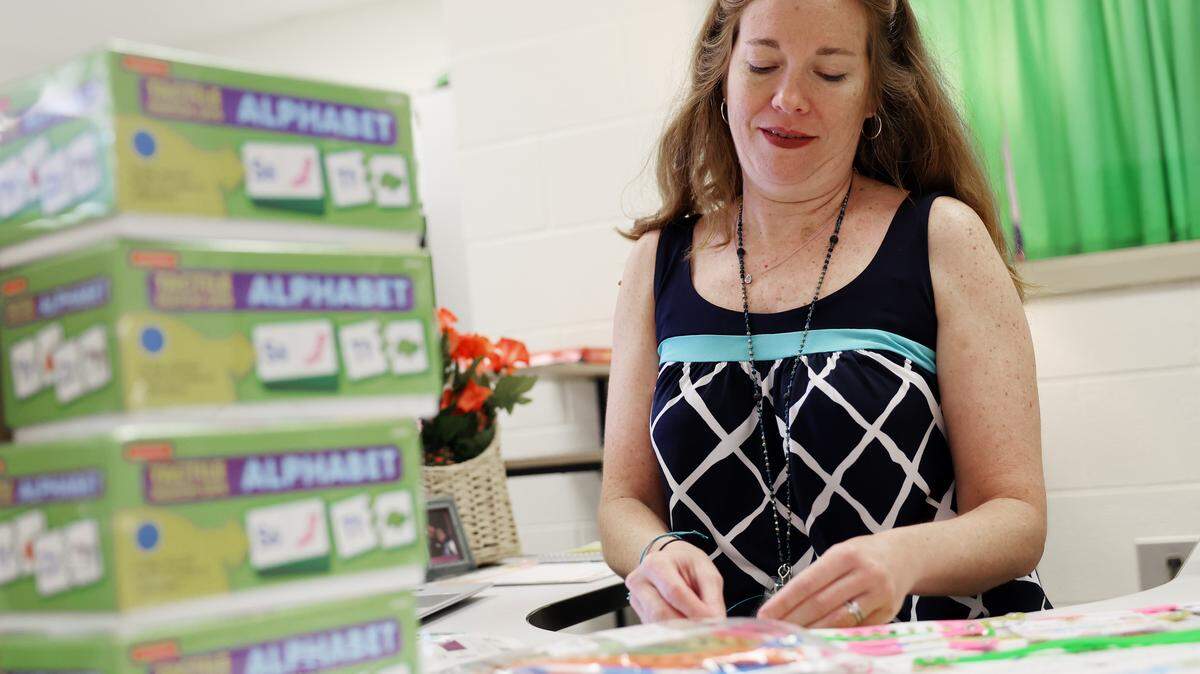 Kindergarten teacher at Richmond Drive Elementary School prepares teaching materials Tuesday, July 29, 2025 at the Rock Hill, S.C. school.