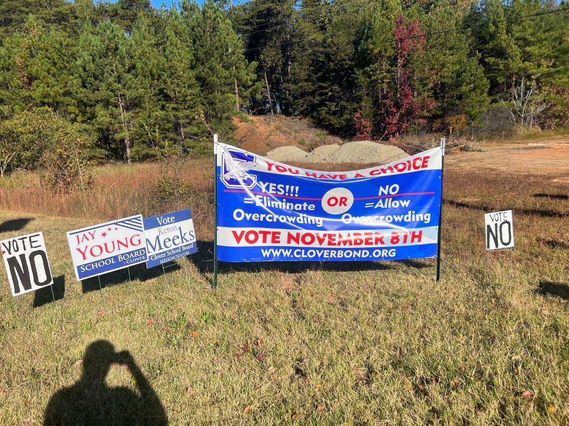 Signs on Highway 55 express both support and dissent for the bond referendum, which is set to be voted on on Nov. 8.