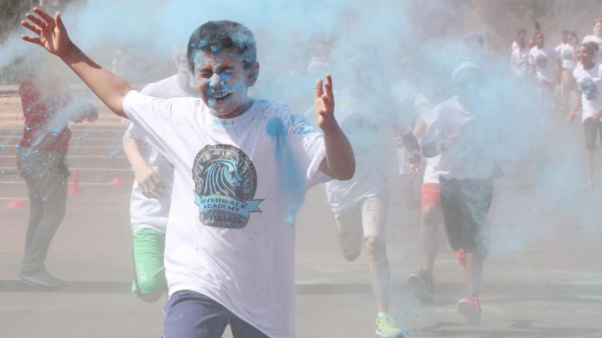 Ahmed Elkosheri runs at the Riverwalk Academy Boosterthon Color Run Thursday in Rock Hill.