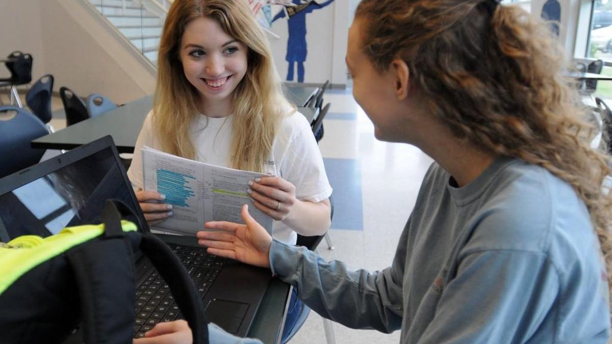 In this 2017 file photo, York Preparatory Academy senior Danielle Hancock, left, and junior Savannah Hancock, study at the school's student union. 2018-19 enrollment opens Sunday for the Rock Hill charter school.