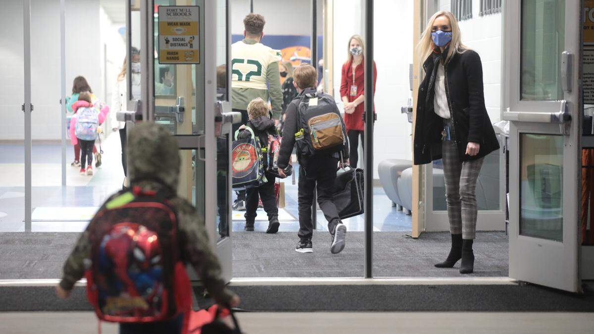 In this file photo, River Trail Elementary School students enter the school in Fort Mill. The school district has plans in its budget to increase starting teacher pay to $50,000 beginning this fall.