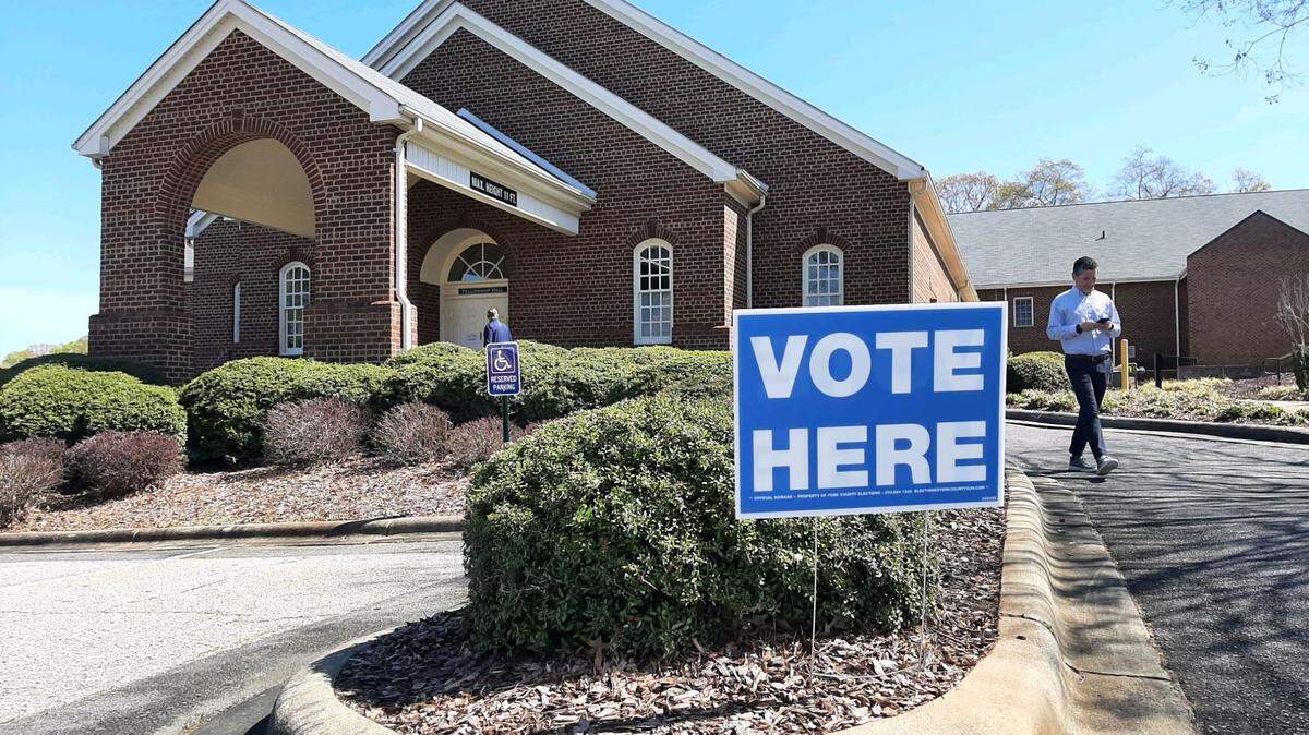 Voters walk in and out of a precinct at Unity Presbyterian Church in Fort Mill in March. York and Lancaster county council seats will be decided in Republican primaries in June.