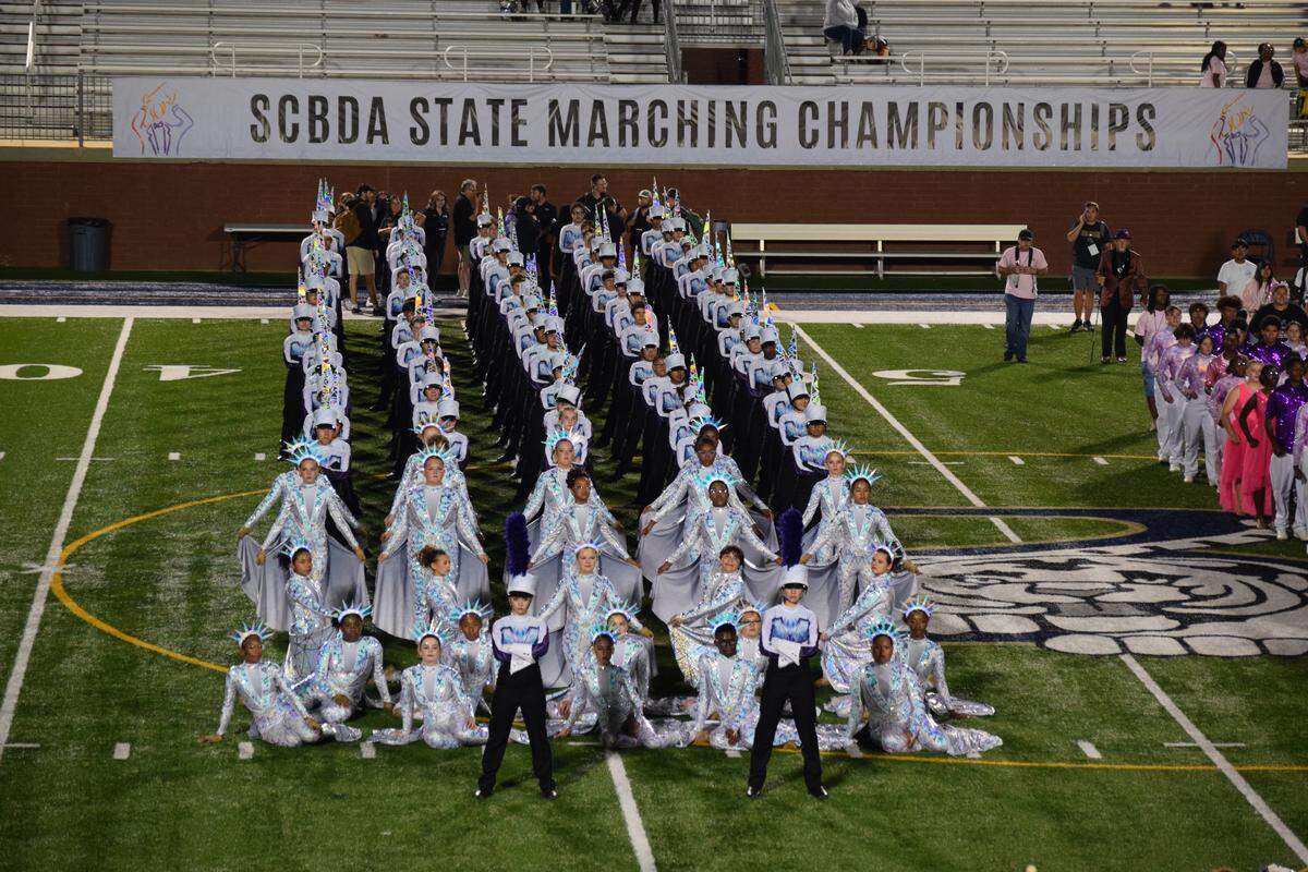York lines up Saturday night at Blythewood High School for the 4A state championship awards presentation. York finished third overall, earning a bronze medal.