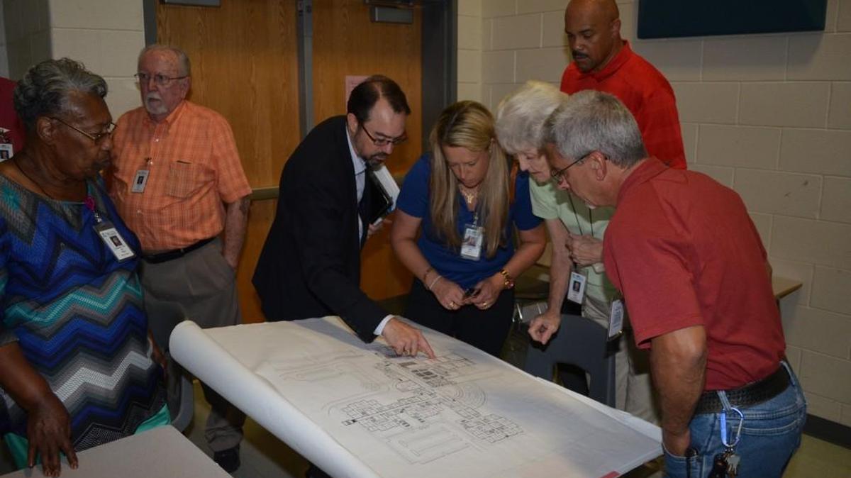 The Rock Hill school board last year looked over plans for school improvements.