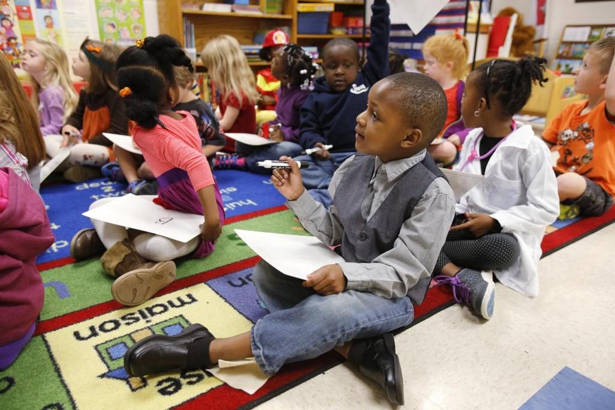 Herald file (2014): The kindergarten French Immersion class at Rosewood Elementary School in Rock Hill includes Marcel Pressley, foreground. Rosewood was one of three RHSD elementary schools closed as part of the district’s rezoning plan.