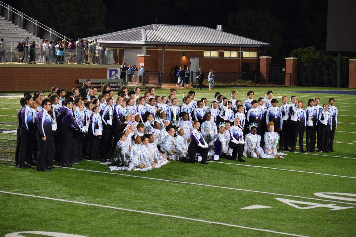 The York marching band poses for a photo after winning third place Saturday at the state 4A competition.