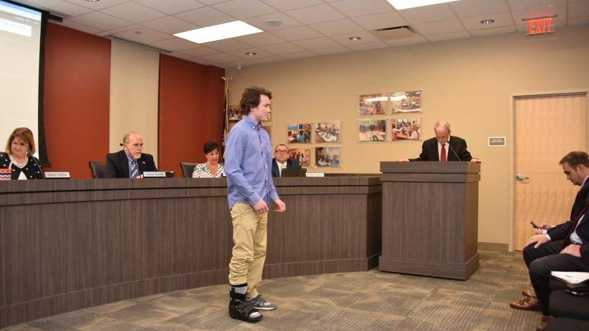 Fort Mill High School wrestler A.J. Leitten walked into a school board meeting with a broken toe - the result of his latest state champion win.