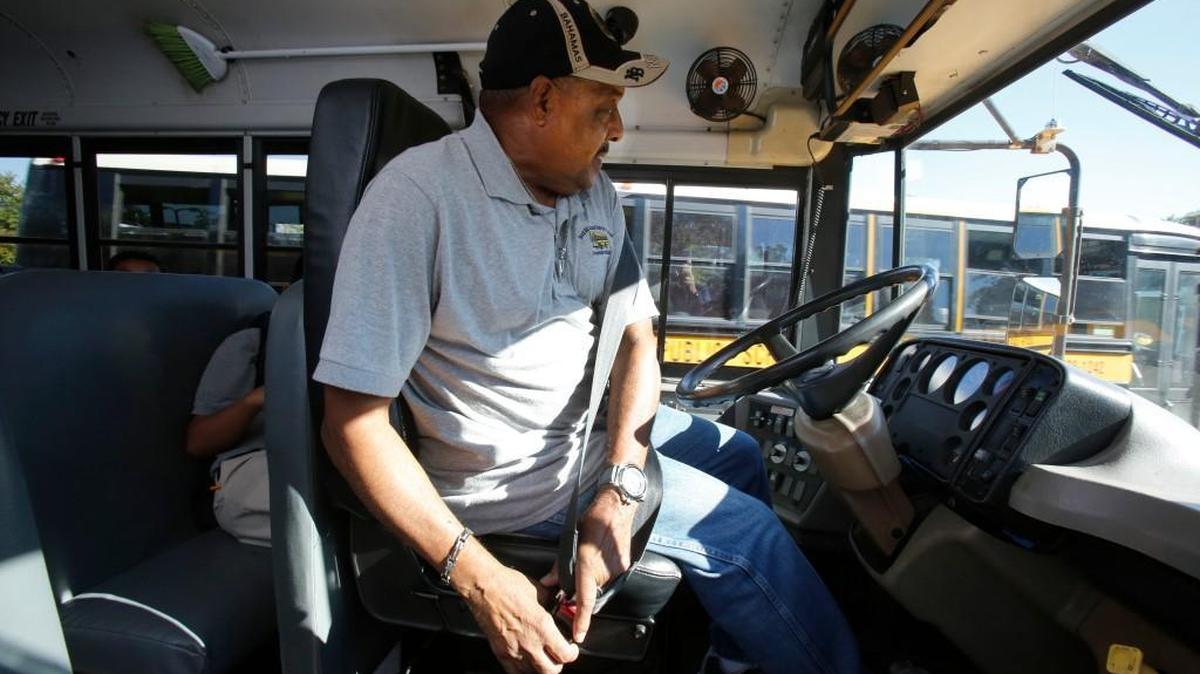 
Rock Hill bus driver Bobby Emerson buckles up before heading out on his route at Sullivan Middle School Wednesday afternoon. Local school districts say they have jobs available for bus drivers.
