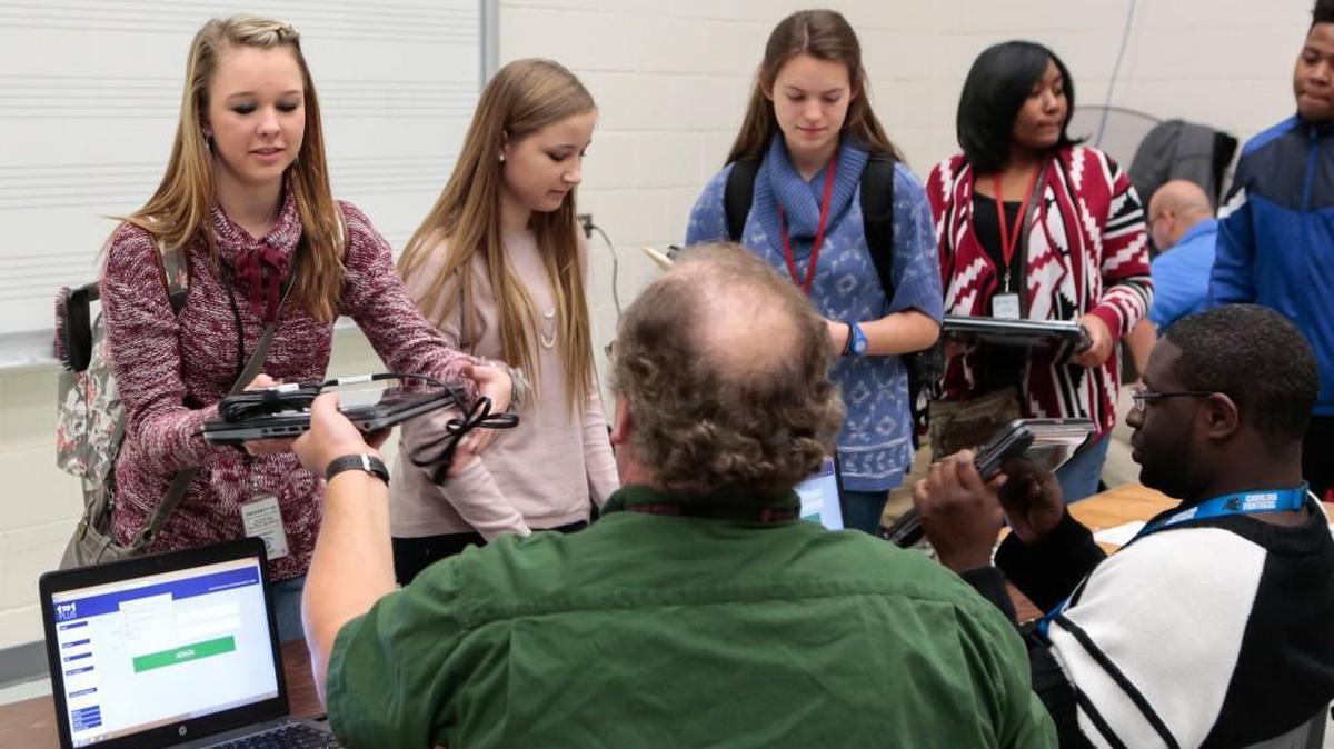 South Pointe High School students receive new laptops.