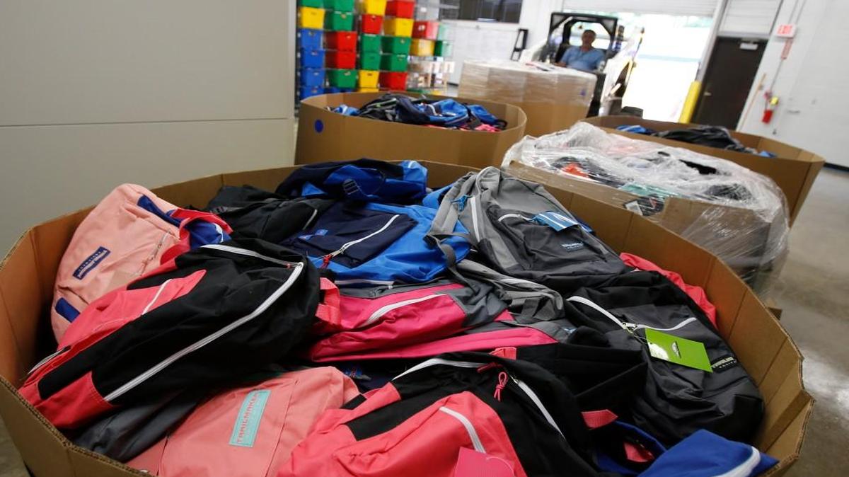 
Rock Hill schools received five pallets with 1,000 backpacks filled with school supplies, 3,000 hygiene kits, and 3,600 kits packed with food and juice boxes for Back the Pack from Elevation Church.
