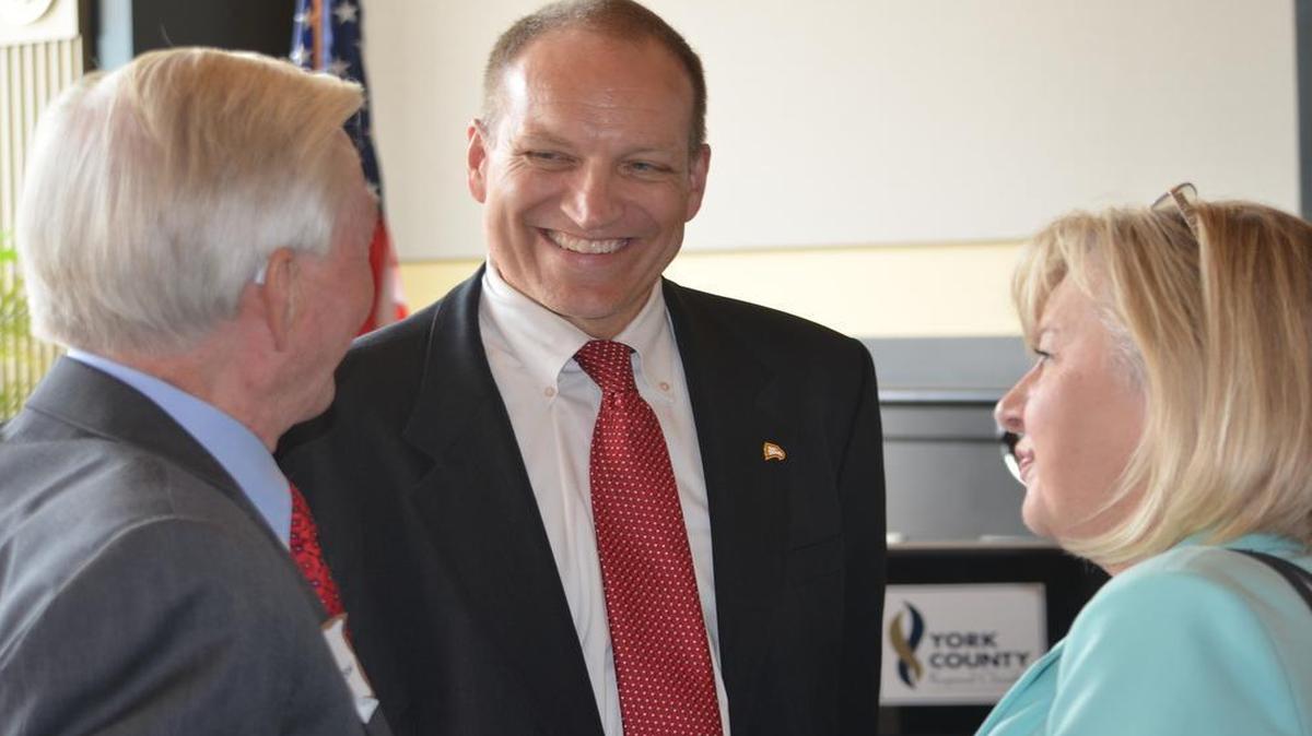 
Winthrop University President Dan Mahony talks with former Winthrop trustee Bob Thompson, left, and Laurie Leader, assistant vice president at South State Bank, following Mahony’s presentation to the York County Regional Chamber of Commerce on Friday. 

