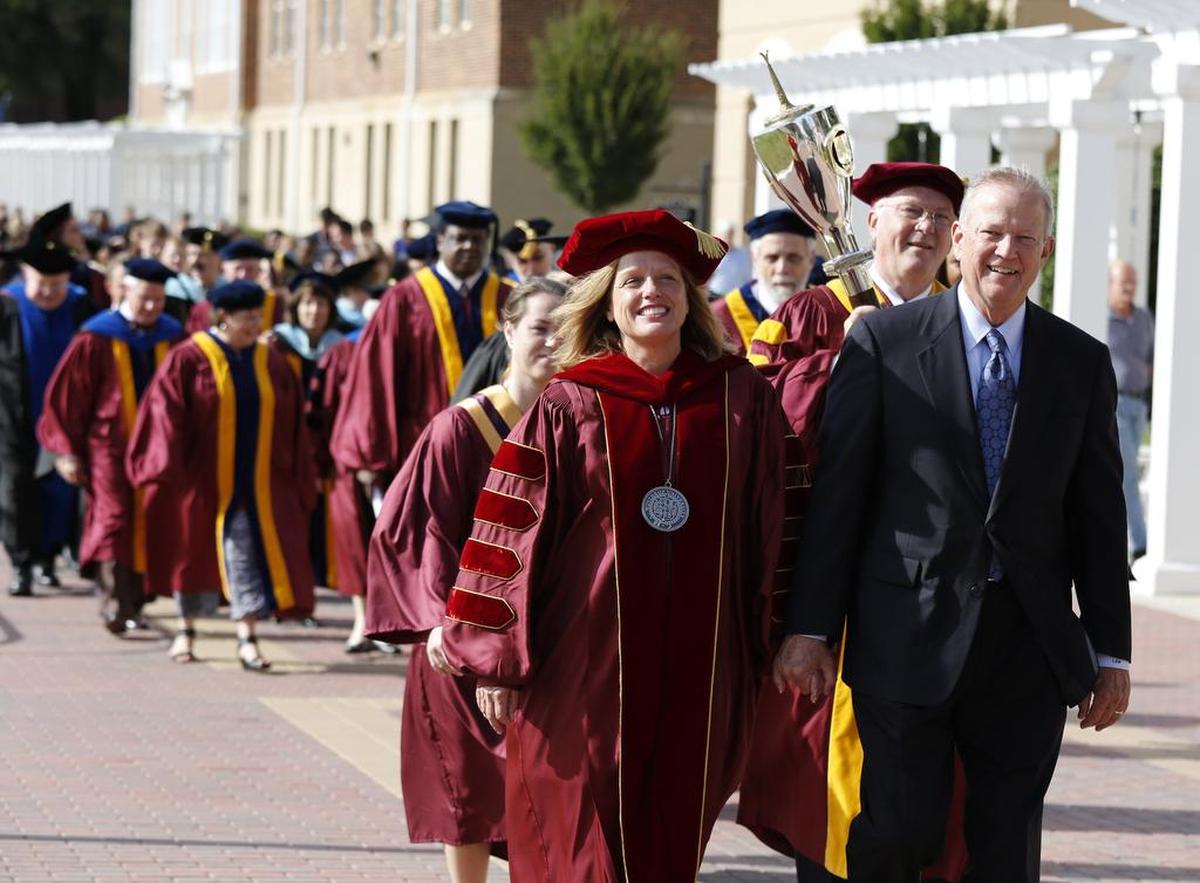 Jamie and Larry Williamson during Fall 2013 Convocation at Winthrop University. 