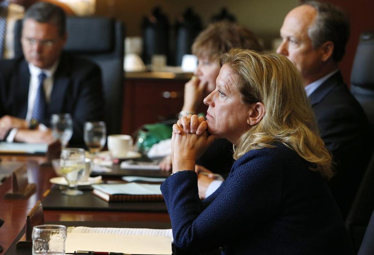 Jamie Comstock Williamson listens as the Winthrop University Board of Trustees votes to suspend her on June 13, 2014.