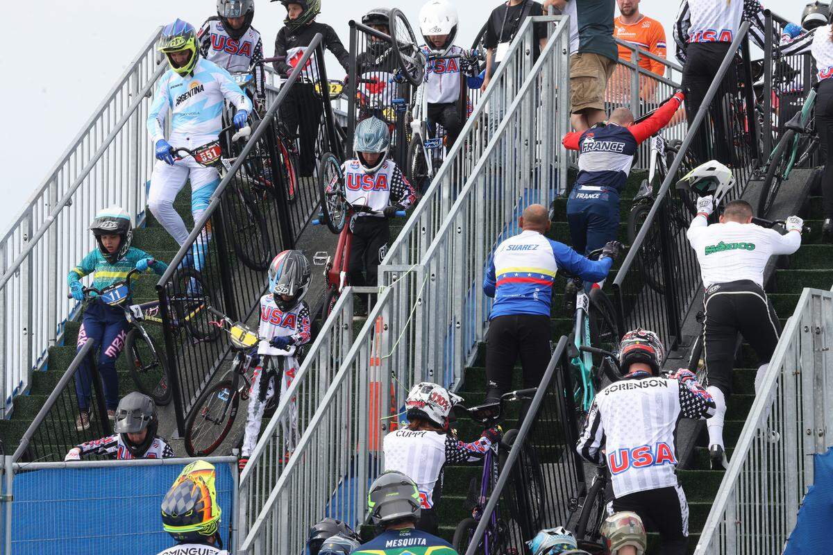 BMX athletes walk up and down the steps to the track before competing Monday at the BMX World Championships in Rock Hill.