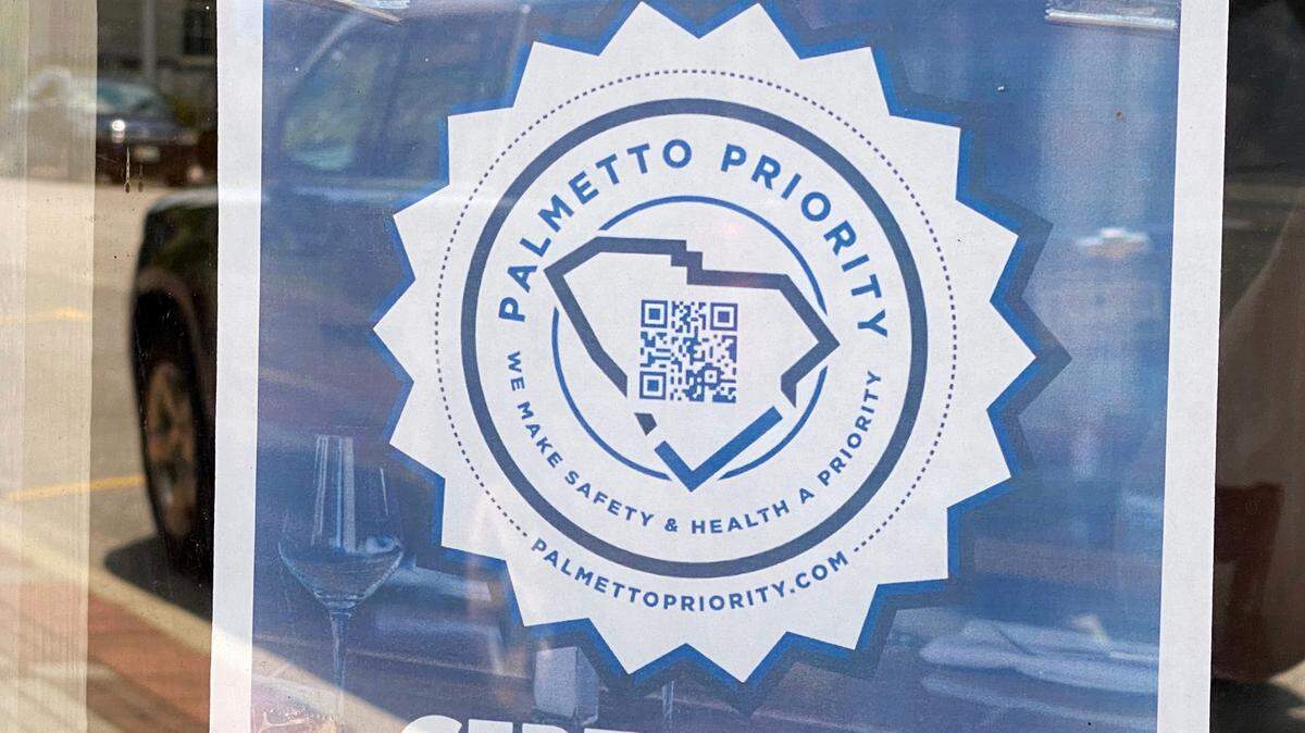 The Palmetto Priority sticker is attached to a window at The Flipside restaurant in Rock Hill on Friday.