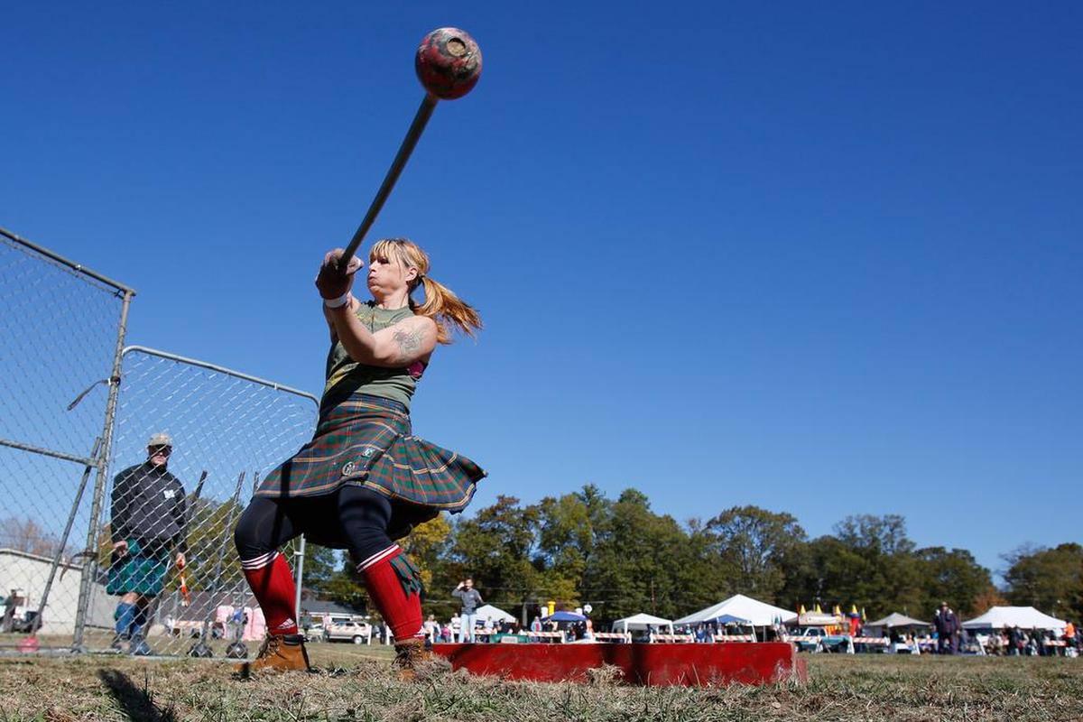 Amanda Ford throws the light hammer at Clover’s Highland Games and Scots-Irish festival in this 2016 file photo