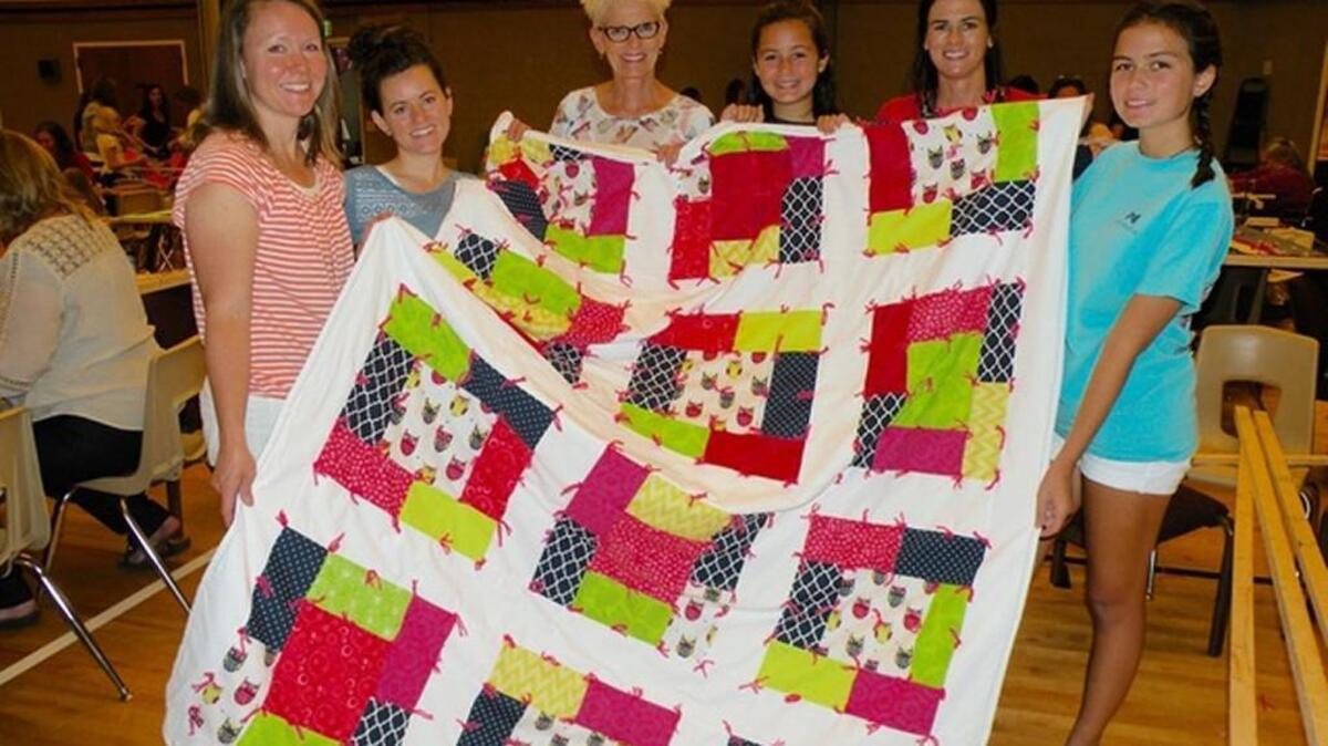 Members of the Church of Jesus Christ of Latter-day Saints donated 125 homemade quilts to Emily’s House, a homeless shelter in Rock Hill.