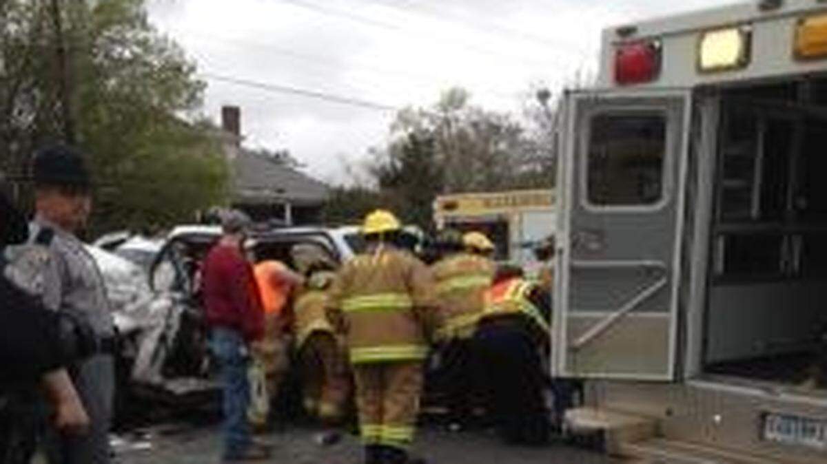 
Emergency workers tend to an injured motorist on S.C. 9 near Richburg on Friday.
