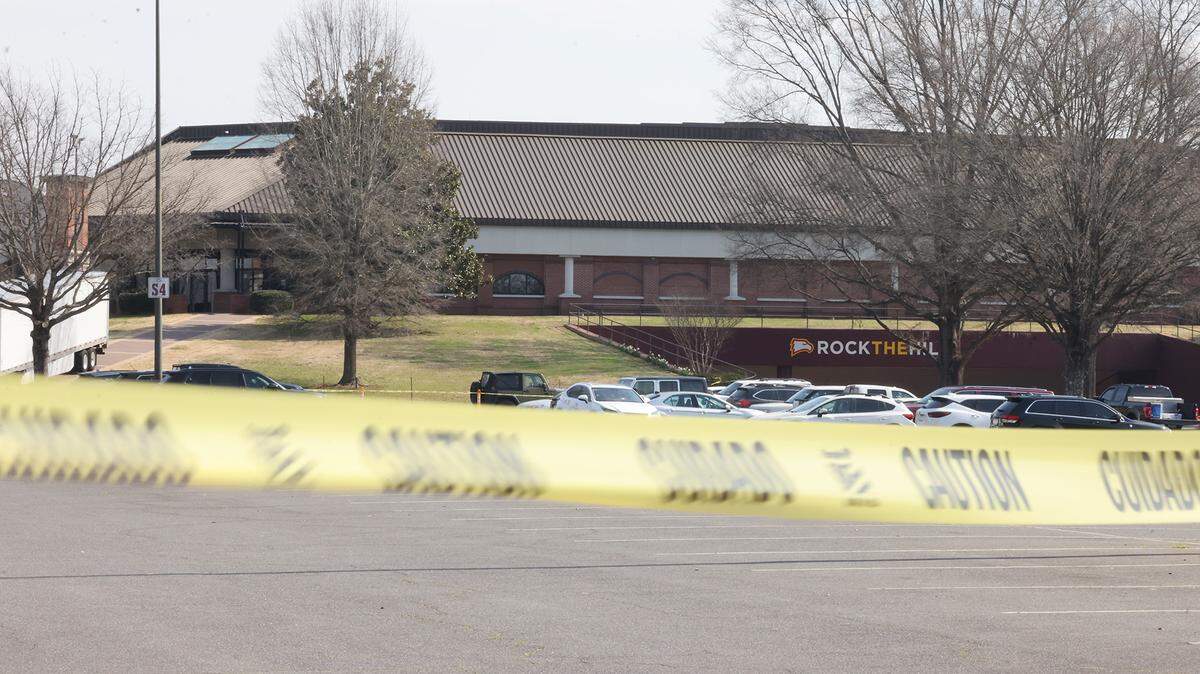 Caution tape ropes off the parking lot at the Winthrop Coliseum on Thursday. Former President and candidate Donald Trump will hold a rally at the coliseum Friday.