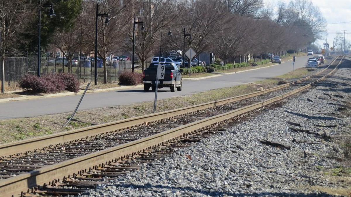 Rock Hill police say a man struck and killed by a train on East White Street was sleeping on the track.