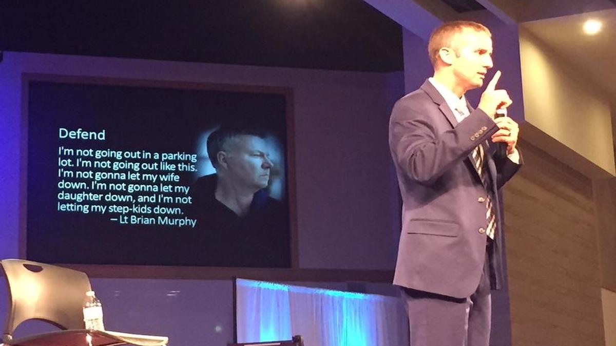 
Rock Hill Police Detective Michael Chavis talks about confronting an attacker during an active-shooter scenario. Chavis was one of several officers to speak at Thursday's seminar at First Baptist Church Rock Hill, which focused on helping church leaders prepare for an active-shooter scenario in their places of worship. 
