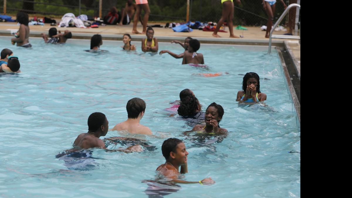 
You can always tell summer vacation has arrived when you see children flocking to Rock Hill's four public pools: Boyd Hill Recreation Center: Monday - Friday: 2 PM - 6 PM, Saturday; 1 PM - 5 PM 1165 Constitution Blvd. Emmett Scott Recreation Center: Monday - Friday: 1 PM - 6 PM, Saturday: 1 PM - 5 PM 801 Crawford Rd. Oakwood Acres Park Pool: Monday - Friday: 1 PM - 6 PM, Saturday: 1 PM - 5 PM 2100 Montclair Dr.Northside Recreation Center: Monday - Friday: 1 PM - 6 PM, Saturday: 1 PM - 5 PM 900 Annafrel St. These swimmers were enjoying the afternoon at Northside Recreation Center.
