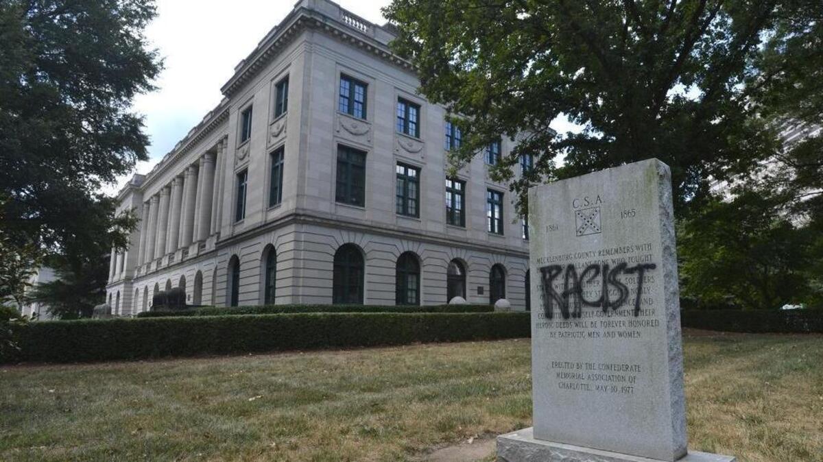 A monument that used to sit outside the old Old City Hall will be moved to Elmwood Cemetery, City Manager Ron Carlee says.