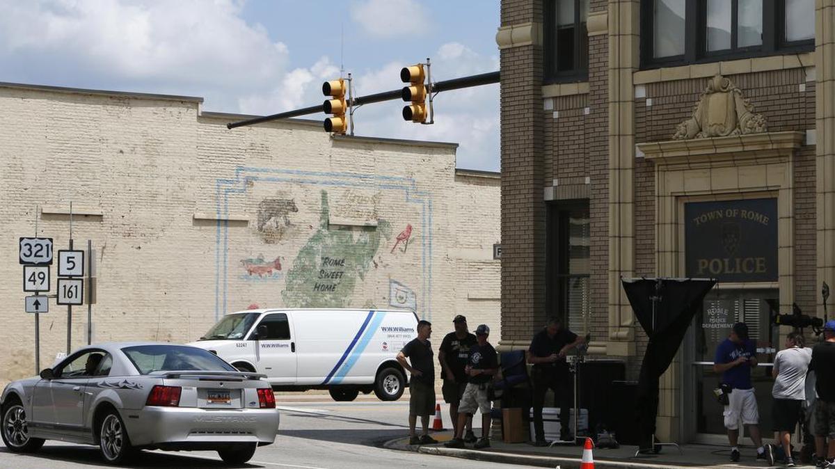 
The production company making "Outcast" was filming in York Tuesday. There is a mural of West Virginia painted at the corner of East Liberty and Congress. The filming was taking place in and around the old bank building at that intersection.
