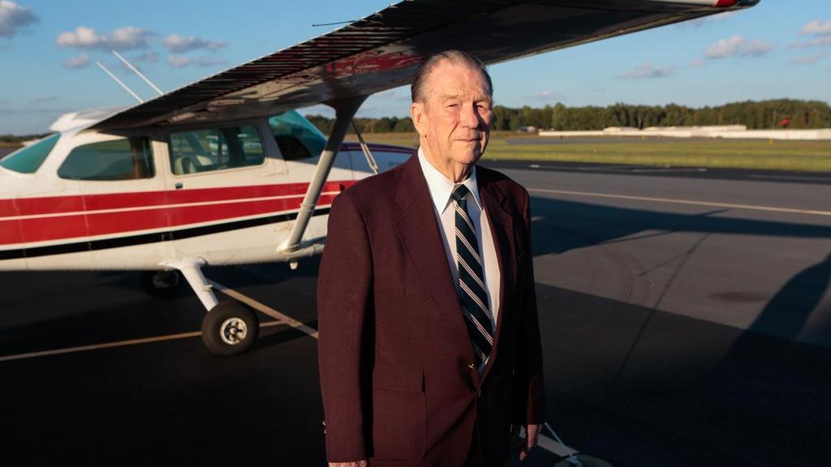 Wayne Jones stands in front of a Cessna 172, before being awarded the Wright Brothers FAA Master Pilot Award on Monday.