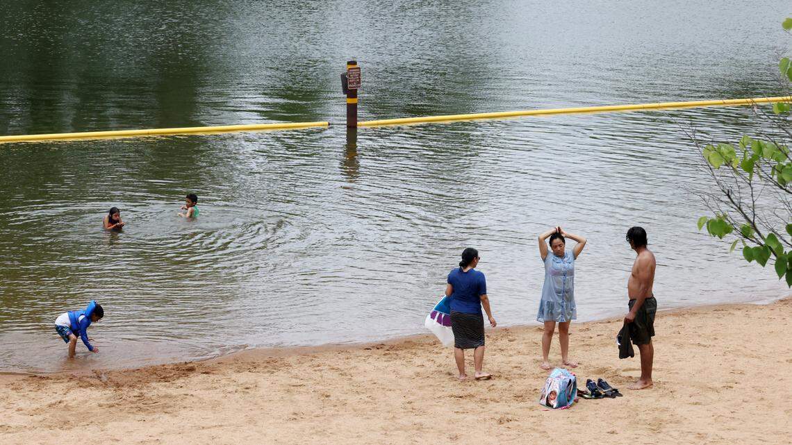 Visitors to Rock Hill Lake Park take advantage of the beach and swimming area this month. The city-run park is only the second public swimming area on Lake Wylie.