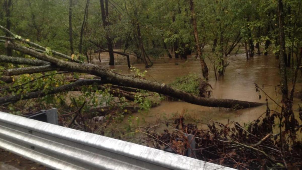
Localized flooding caused by remnants of Hurricane Joaquin was being reported around York County Saturday morning. Here, a creek under Pleasant Road south of Carowinds Boulevard near Fort Mill was over its banks, close to reaching the roadway. 
