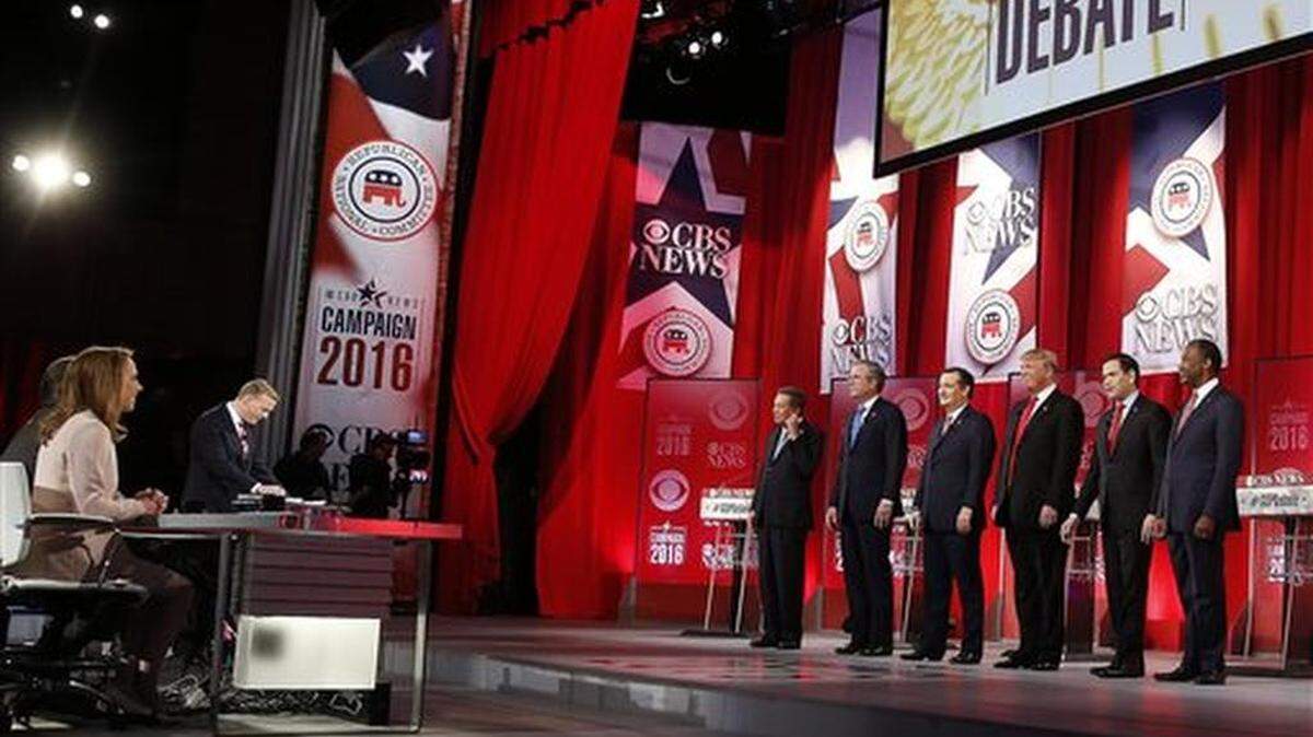 Republican presidential candidates, from left, Ohio Gov. John Kasich, former Florida Gov. Jeb Bush, Sen. Ted Cruz, R-Texas, businessman Donald Trump, Sen. Marco Rubio, R-Fla., retired neurosurgeon Ben Carson take a moment of silence for U.S. Supreme Court associate justice Antonin Scalia who died today, during the CBS News Republican presidential debate at the Peace Center, Saturday, Feb. 13, 2016, in Greenville, S.C.