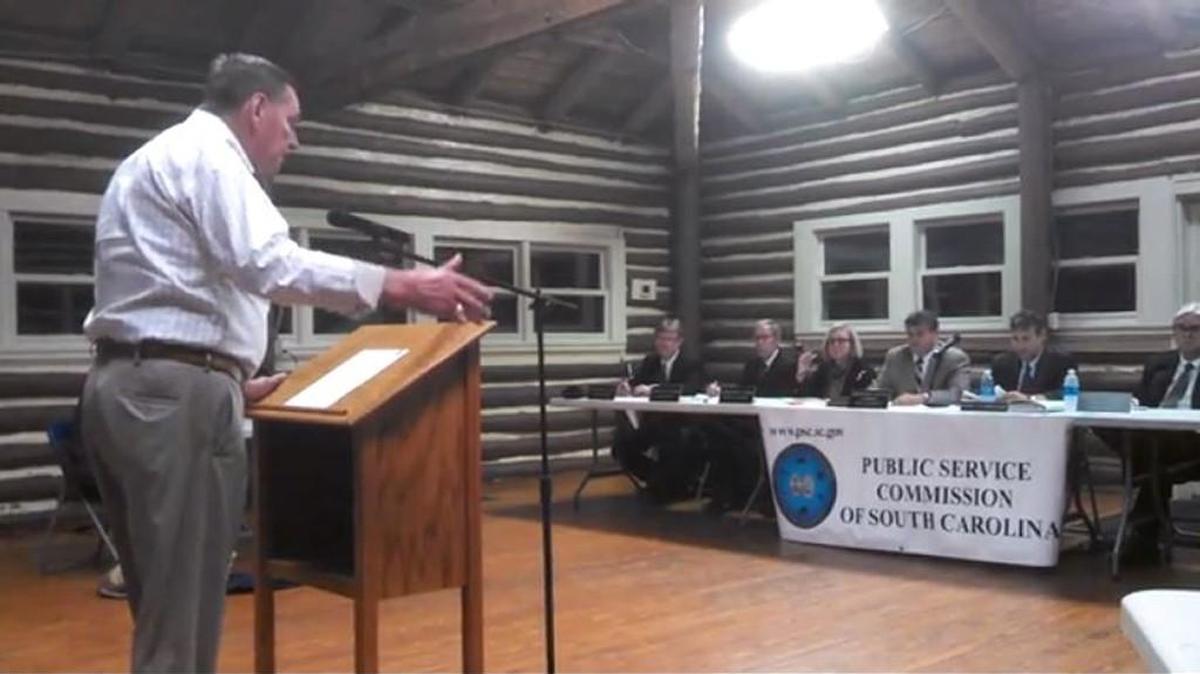 A Carolina Water Service customer testifies at a hearing in Lake Wylie held to gather input on the utility’s proposed rate increase.