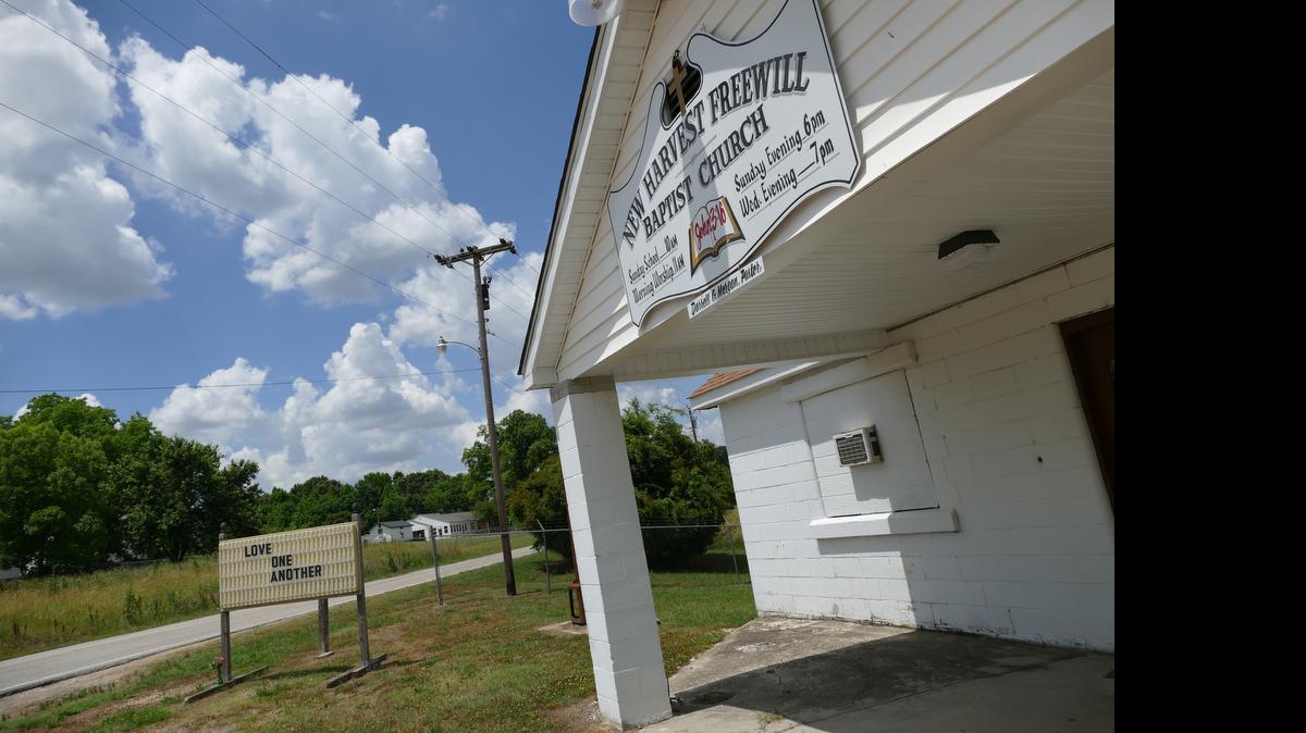 
A small vase of flowers placed under the marquee of New Harvest Freewill Baptist Church was the only sign of life at the church Friday. Pastor Darrell Morgan was shot and killed by Lancaster County Sheriff’s deputies Thursday after allegedly pointing a gun at and threatening the deputies, who were responding to a domestic dispute between Morgan and his estranged wife. 
