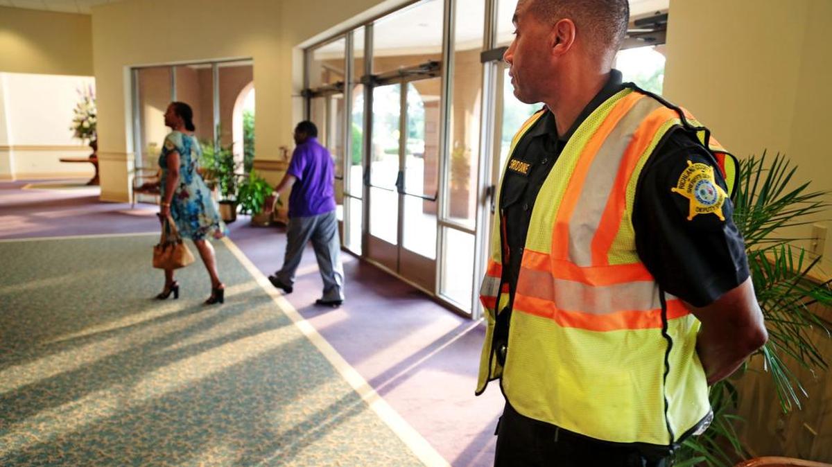 Richland County Deputy Rickey Griddine is part of the security team at Bible Way Baptist Church.