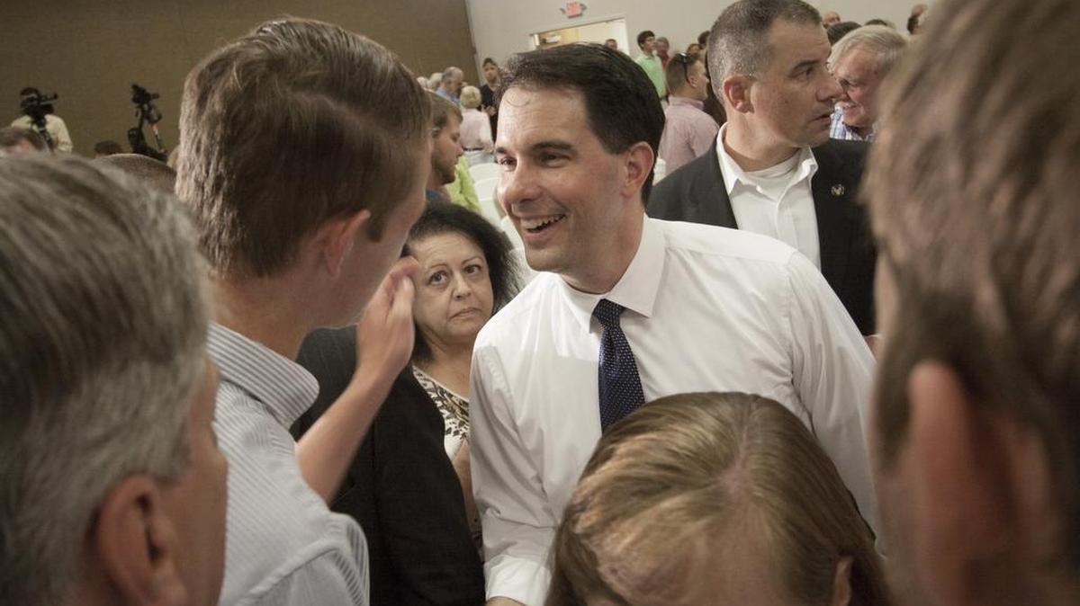 
Republican presidential candidate Scott Walker greets visitors at a campaign stop at the American Legion in Rock Hill on Sunday.
