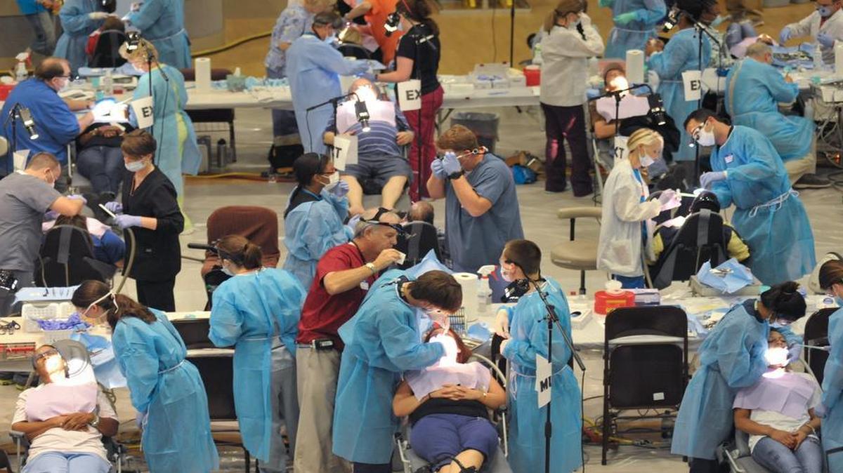 
Volunteer dental teams from across the state work in the extraction room at First Baptist Church in Rock Hill during the annual Dental Access Day organized by the SC Dental Association last August.
