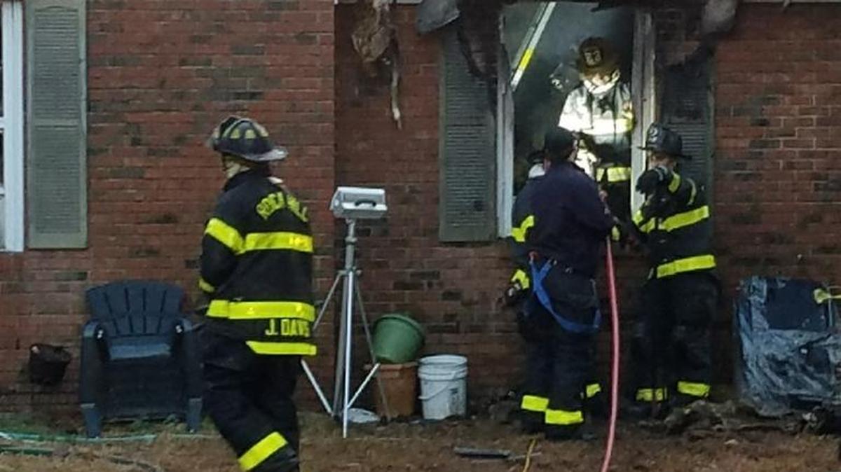 Rock Hill firefighters at a house fire on Devore Place in Rock Hill.