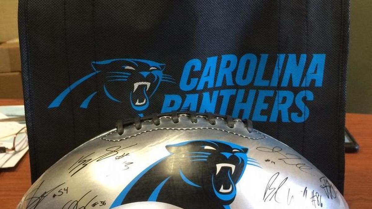 Football with Coach Ron Rivera and Panthers players’ signatures up for auction to support Rock Hill nonprofit.