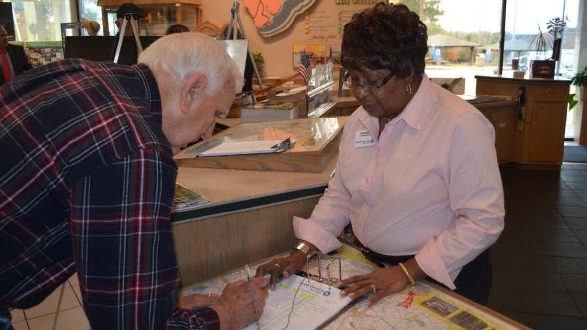Johnnie Mae assists Carol Kimrey of Maiden, N.C. at the Fort Mill Welcome Center on Thursday. Even in the digital age the new welcome centers will stress the personal touch.
