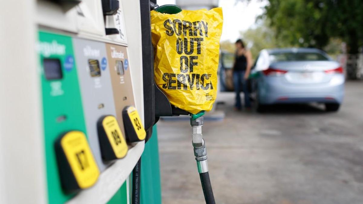 A "Sorry out of Service" sign is placed on one of the gas pumps at a gas station in Athens, Ga., Friday. Gasoline prices in the U.S. have risen to new high amid continuing fears of shortages in Texas and other states after Hurricane Harvey's strike. In South Carolina, the average has increased by 20 cents.