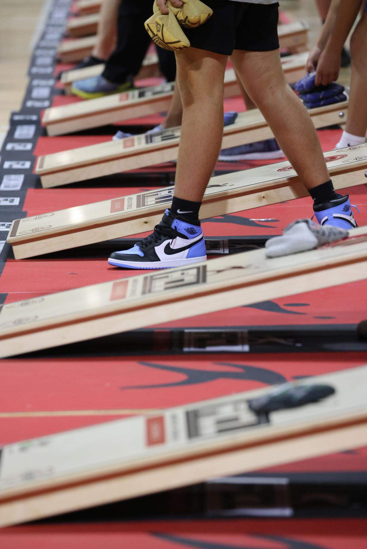 Cornhole players wait to throw their bags Friday at the American Cornhole League’s World Championships in Rock Hill, S.C.