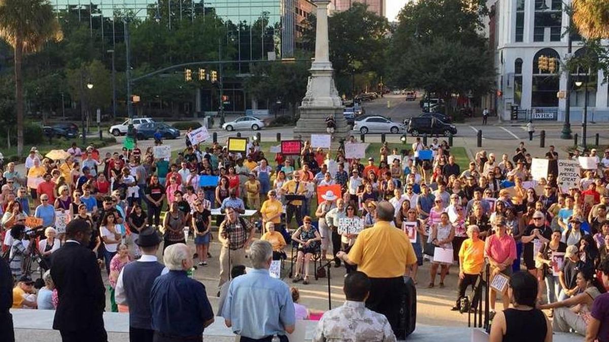 People who support keeping the DACA program in effect for immigrant children at a September prayer vigil outside the South Carolina Statehouse in September.