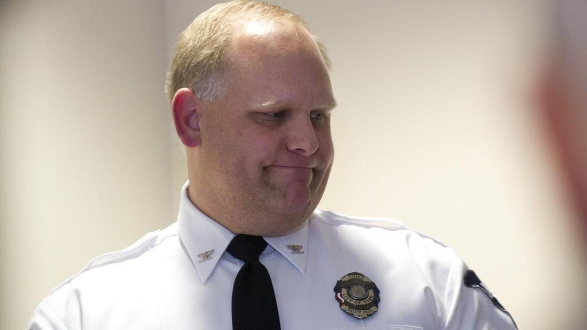 York Police Chief Andy Robinson looks away Tuesday after detailing the shooting of one of his officers.