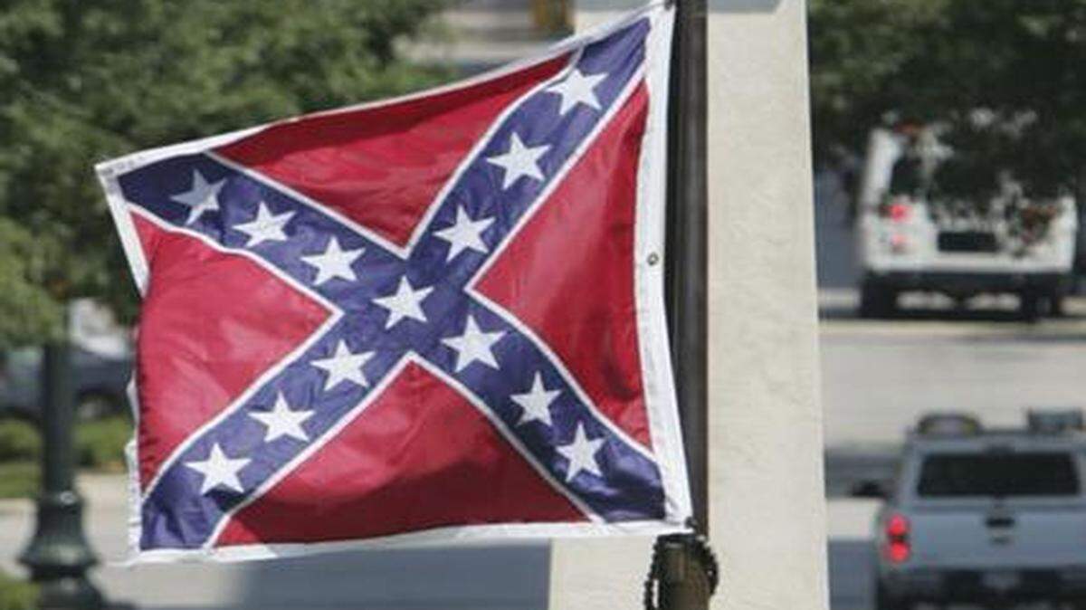 
The Confederate flag flutters in front of South Carolina’s Statehouse each day. 
