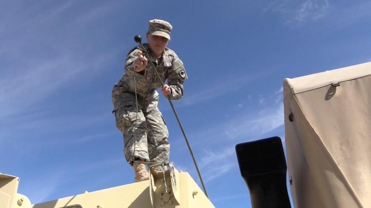 
Sgt. Kortni Mykytka lashes down a radio antennae on top of a National Guard truck Wednesday before she and about 40 other soldiers left Rock Hill’s armory for flooded areas near Columbia and Charleston.
