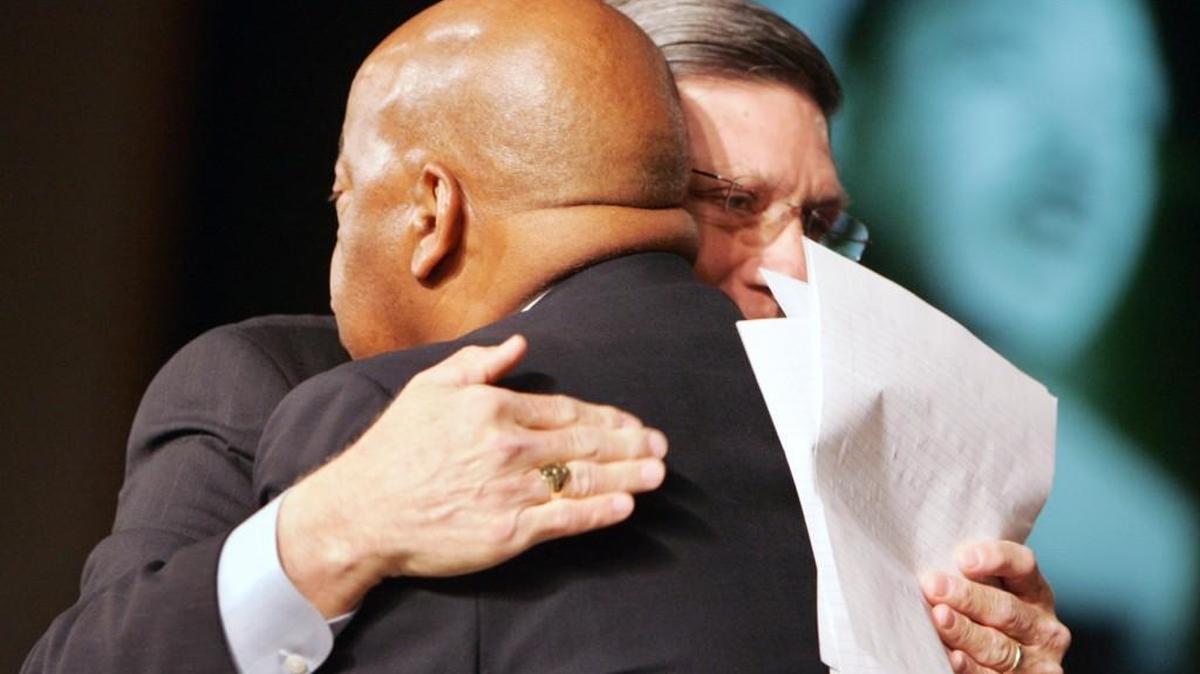 In this 2008 photo, Rock Hill Mayor Doug Echols, right, embraces U.S. Rep. John Lewis, D-Ga. at the fifth annual Martin Luther King Jr. Interfaith Prayer Breakfast in Rock Hill.